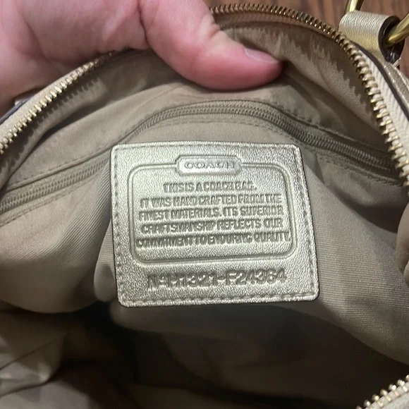Gold coach purse